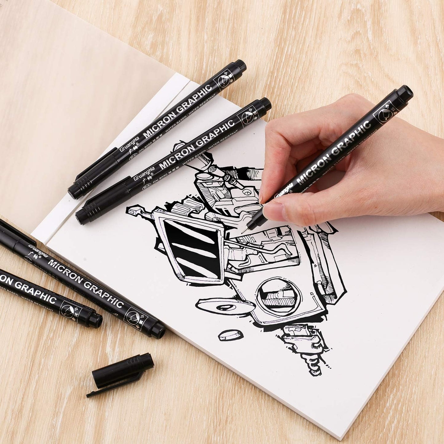 Set 12 Feutres Noirs, Ebook offert et -50% sur le carnet croquis et le set de crayons graphite !